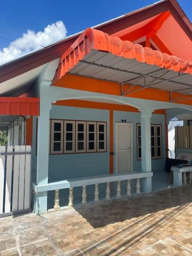 a model of a house with an orange roof at P&I Group Home 4 Karon beach in Karon Beach