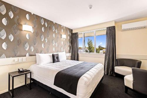 Postel nebo postele na pokoji v ubytování Hotel Elms Christchurch, Ascend Hotel Collection