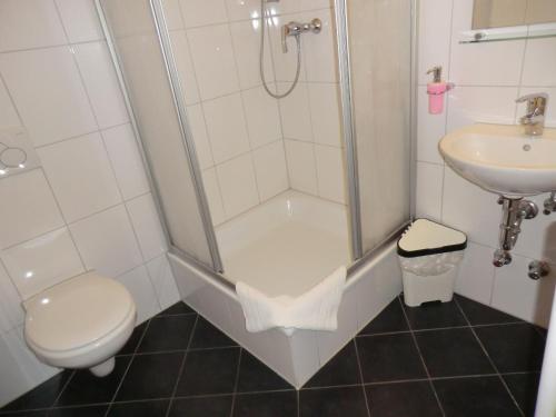 
A bathroom at Hotel Andra München
