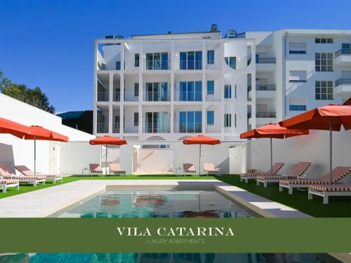 a rendering of a hotel with a swimming pool and umbrellas at Vila Catarina Luxury Apartments in Porto