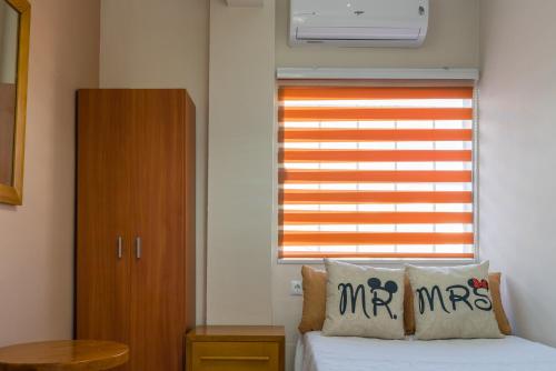 Postel nebo postele na pokoji v ubytování Hostal Imperial