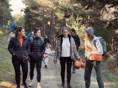 a group of people walking down a path at Basecamps Cerdanya in Queixans