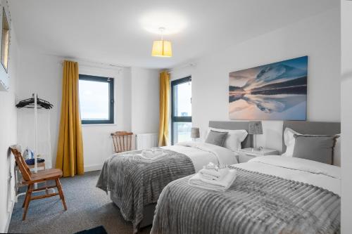 Ένα ή περισσότερα κρεβάτια σε δωμάτιο στο One and Two Bed Apartments Slough near Heathrow