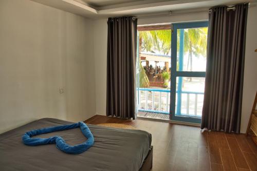 Postel nebo postele na pokoji v ubytování Mad Monkey Koh Rong