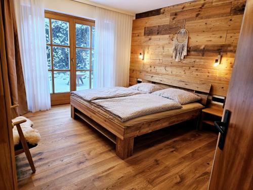 Ένα ή περισσότερα κρεβάτια σε δωμάτιο στο Apartment Irma Ski in & Ski out