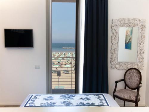 Μια τηλεόραση ή/και κέντρο ψυχαγωγίας στο Hotel Madalù