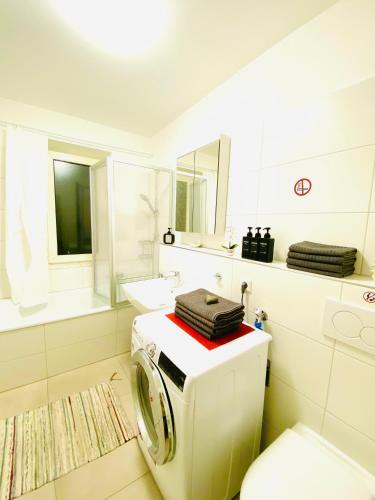 Foto WelcomeToMessePremium Three Bedroom Apartment 3