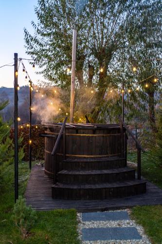 a set of stairs with lights and lights at Glamp In Style Pods Resort in Bran