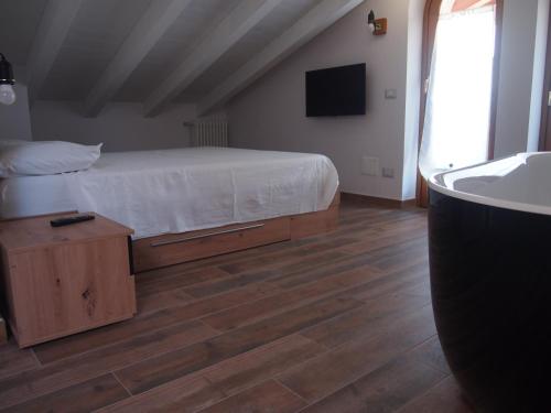 Cama o camas de una habitación en Roncola 2021
