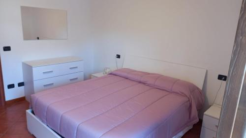 Donizetti Apartment di Manenti Andreaにあるベッド