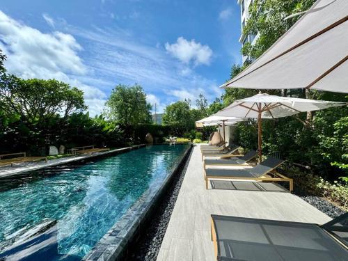 Bazén v ubytování New apartment 2bedrooms in Laguna lakeside Bang Tao beach nebo v jeho okolí