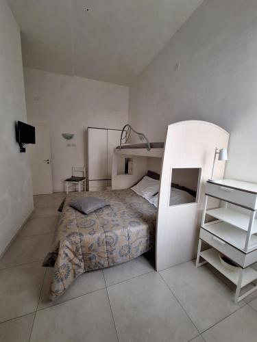 Posteľ alebo postele v izbe v ubytovaní Home il Piccolo Nido