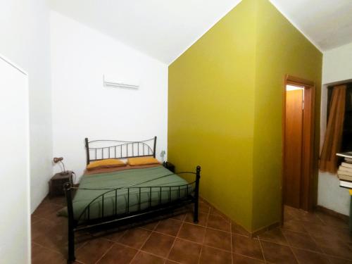 Postel nebo postele na pokoji v ubytování Alghero - Grotte di Nettuno cortes