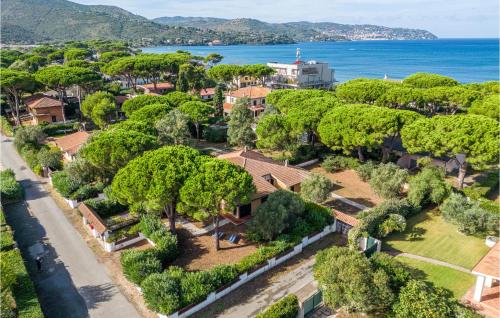 an aerial view of a residential neighborhood with trees at Poiana in Orbetello