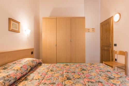 Ένα ή περισσότερα κρεβάτια σε δωμάτιο στο Casa Bamby - Cevedale