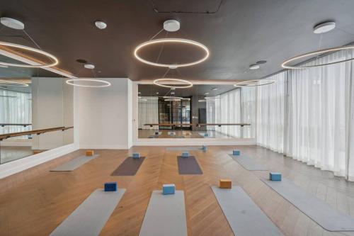a large room with yoga mats on the floor at NEW Luxury Bay View Downtown 1 Bedroom in Miami