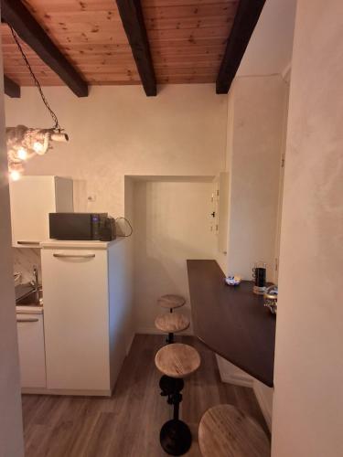 Kuchyň nebo kuchyňský kout v ubytování Lighthouse Suites Trastevere