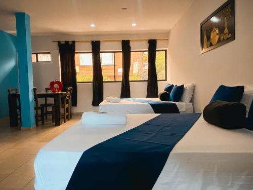 Krevet ili kreveti u jedinici u okviru objekta Hotel Lleras # 1