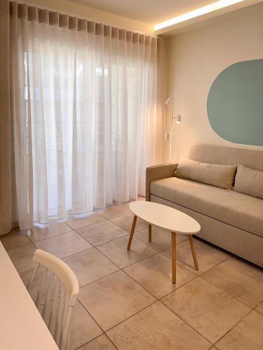 Χώρος καθιστικού στο Casa Quattro by Immobilis