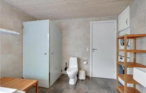 a bathroom with a toilet in a room at Holiday Home Kronvildtvej Brovst I in Brovst
