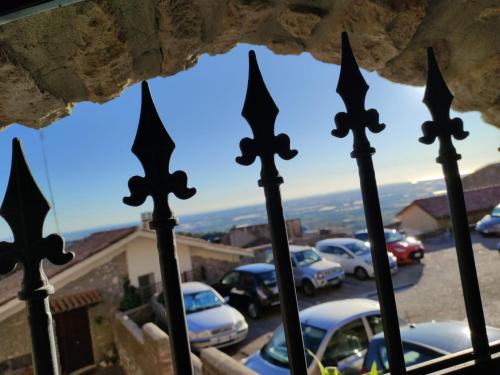 a view of cars parked in a parking lot at Numero 33 in Cori