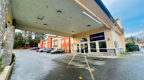 an empty parking lot in front of a store at Studio 6 Suites Portland, OR Downtown OHSU in Portland