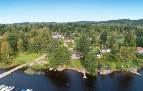 an aerial view of a house on an island in the water at 3 Bedroom Nice Home In Tvärred in Alhammar