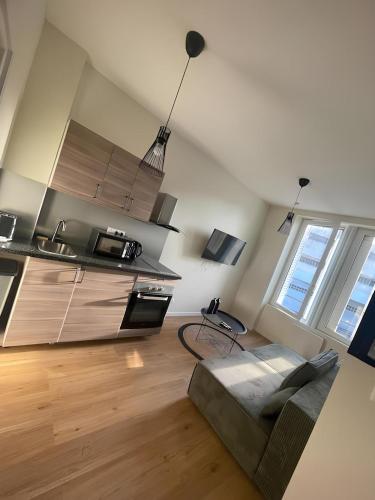 Køkken eller tekøkken på Nancy Cozy Lodge