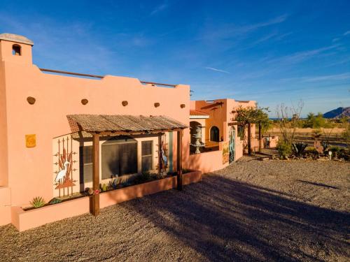 a house in a desert with a gravel driveway at CASA ZUR HEIDE.....BEAUTIFUL San Felipe Rental Home in Playa Unión