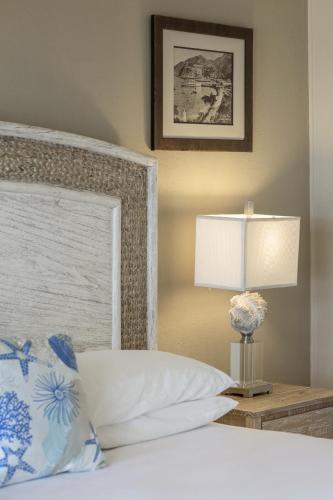 Cama ou camas em um quarto em Hotel Mac Rae