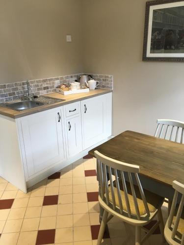 Küche/Küchenzeile in der Unterkunft Greyhound Inn Wilton
