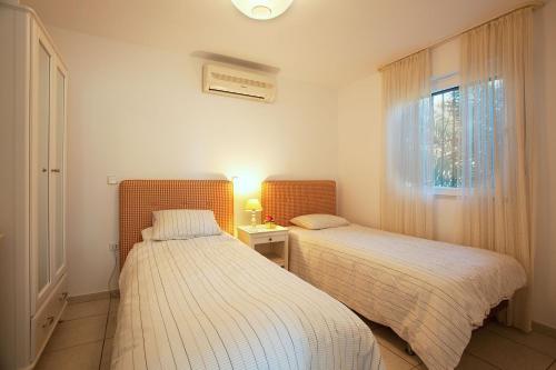 Postel nebo postele na pokoji v ubytování Villa Costa Del Sol