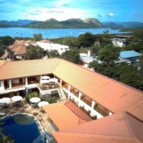 an aerial view of a resort with a swimming pool at Pearl Vista de Coron Resort Hotel in Coron