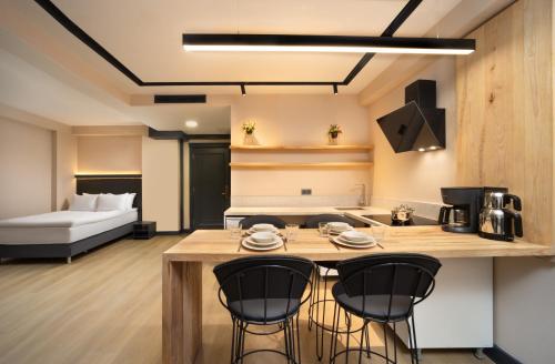 Η κουζίνα ή μικρή κουζίνα στο Şişli Family Time Suites