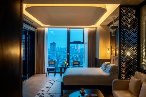 Hotel Insulae Changshaにあるベッド
