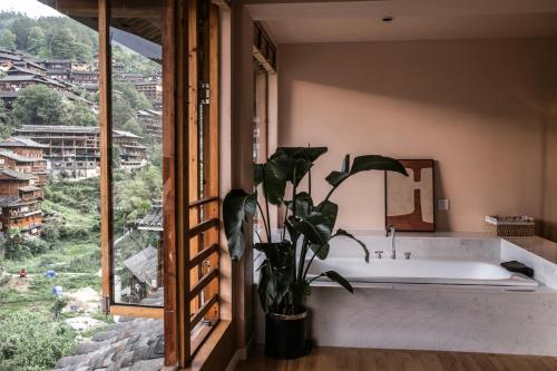 Fotografie z fotogalerie ubytování Xijiang Qianhu Miao Village Mountain and B&B v destinaci Xijiang