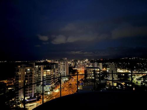 a view of a city at night with lights at Aquavista Penthouse - Stunning 180 Views in Maroochydore