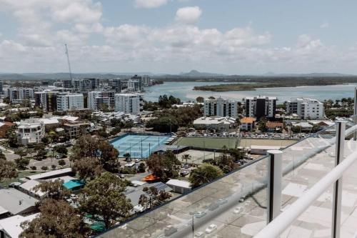an aerial view of a city with a river and buildings at Aquavista Penthouse - Stunning 180 Views in Maroochydore