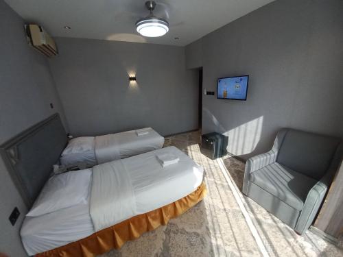 Cama o camas de una habitación en Sur Hotel