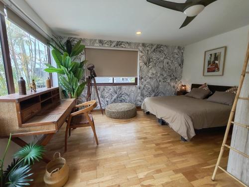 Postel nebo postele na pokoji v ubytování COLIVER - COLIVING A LA RÉUNION