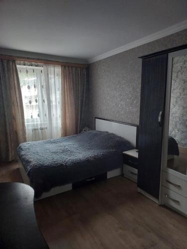 Ένα ή περισσότερα κρεβάτια σε δωμάτιο στο Jrhogher Apartment 2