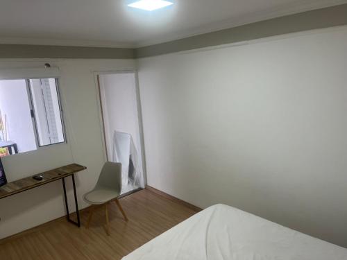 Ένα ή περισσότερα κρεβάτια σε δωμάτιο στο Suite independente condomínio cidade Moncoes