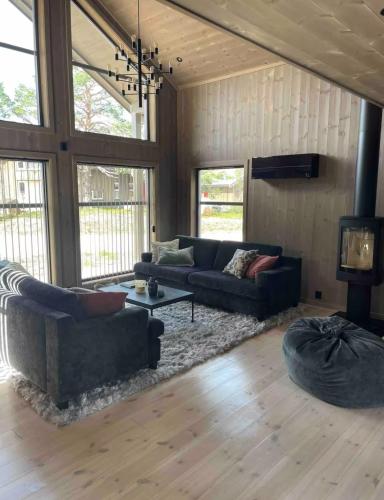 Χώρος καθιστικού στο Modern cabin with sauna