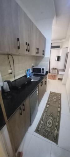 Kuchyň nebo kuchyňský kout v ubytování Casablanca beach resort 412