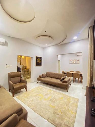 Posezení v ubytování Signature 2Bdr Oasis in Gwarimpa