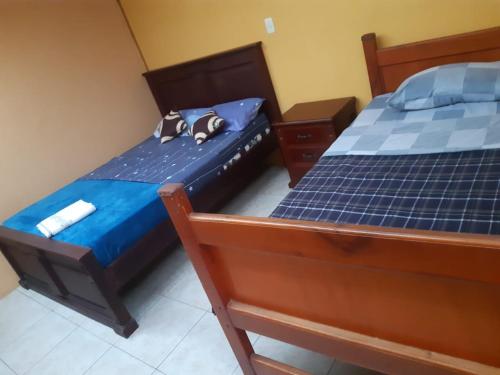 Postel nebo postele na pokoji v ubytování Hostal al Paso