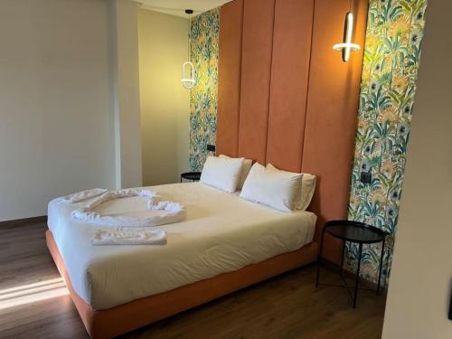 Ένα ή περισσότερα κρεβάτια σε δωμάτιο στο 47 Appartement luxueux proche de la mer