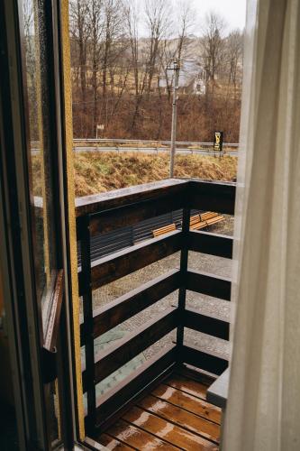 a view of a balcony from a window at SV HOTEL&camp in Lazeshchyna