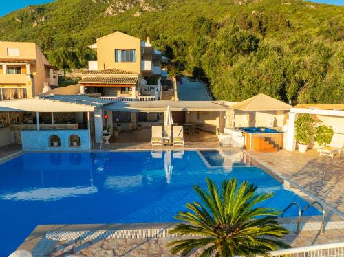 an overhead view of a swimming pool in a resort at Sea View Villa Paramonas in Paramonas