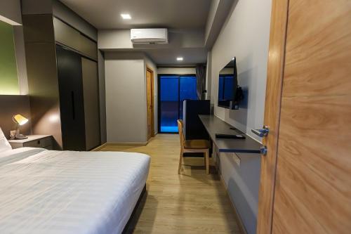 โรงแรมเกิดมานอน ขอนแก่นにあるベッド